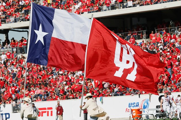 HOUSTON, TX - DECEMBER 05:  The Frontiersmen celebrate a touchdown against the Temple Owls at TDECU Stadium on December 5, 2015 in Houston, Texas. Houston won 24-13 to win the AAC Championship over the Temple Owls.  (Photo by Bob Levey/Getty Images)
