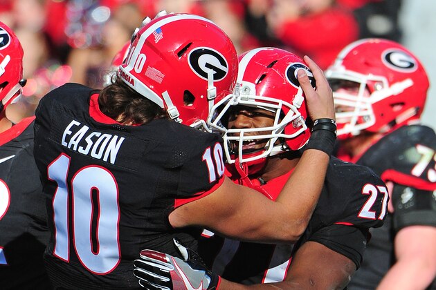 ATHENS, GA - NOVEMBER 19: Nick Chubb #27 of the Georgia Bulldogs is congratulated by Jacob Eason #10 after scoring a touchdown against the Lousiana-Lafayette Rajin' Cajuns at Sanford Stadium on November 19, 2016 in Athens, Georgia. (Photo by Scott Cunningham/Getty Images)