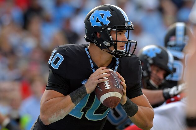 CHAPEL HILL, NC - NOVEMBER 25:  Mitch Trubisky #10 of the North Carolina Tar Heels against the North Carolina State Wolfpack during their game at Kenan Stadium on November 25, 2016 in Chapel Hill, North Carolina. North Carolina State won 28-21.  (Photo by Grant Halverson/Getty Images)