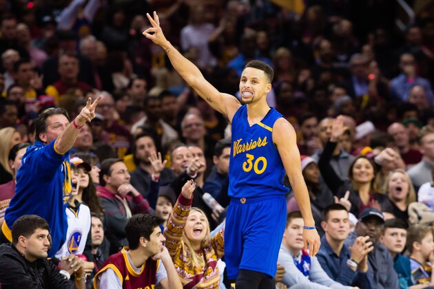 CLEVELAND, OH - DECEMBER 25: Stephen Curry #30 of the Golden State Warriors celebrates after hitting a three point shot during the second half against the Cleveland Cavaliers at Quicken Loans Arena on December 25, 2016 in Cleveland, Ohio. The Cavaliers defeated the Warriors 109-108. NOTE TO USER: User expressly acknowledges and agrees that, by downloading and/or using this photograph, user is consenting to the terms and conditions of the Getty Images License Agreement. Mandatory copyright notice. (Photo by Jason Miller/Getty Images)
