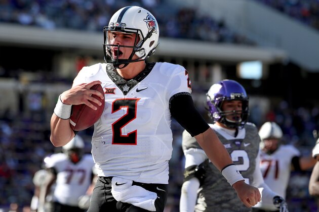 FORT WORTH, TX - NOVEMBER 19:  Mason Rudolph #2 of the Oklahoma State Cowboys celebrates after scoring a touchdown against the TCU Horned Frogs in the second half at Amon G. Carter Stadium on November 19, 2016 in Fort Worth, Texas.  (Photo by Tom Pennington/Getty Images)