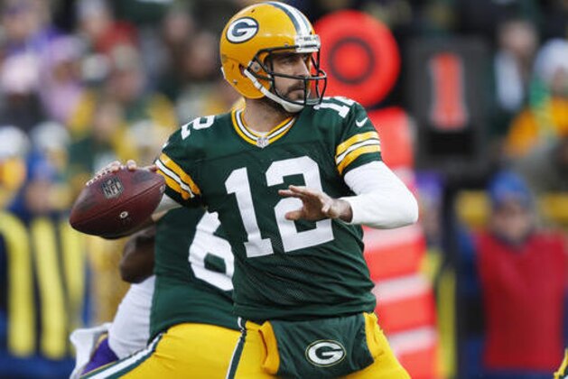 Green Bay Packers' Aaron Rodgers throws during the first half of an NFL football game against the Minnesota Vikings Saturday, Dec. 24, 2016, in Green Bay, Wis. (AP Photo/Matt Ludtke)