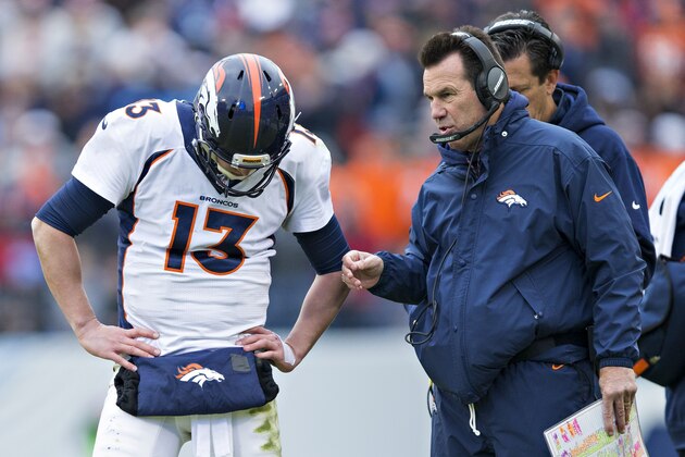 NASHVILLE, TN - DECEMBER 11:  Head Coach Gary Kubiak and Trevor Siemian #13 of the Denver Broncos talk during a timeout during a game against the Tennessee Titans at Nissan Stadium on December 11, 2016 in Nashville, Tennessee.  The Titans defeated the Broncos 13-10.  (Photo by Wesley Hitt/Getty Images)