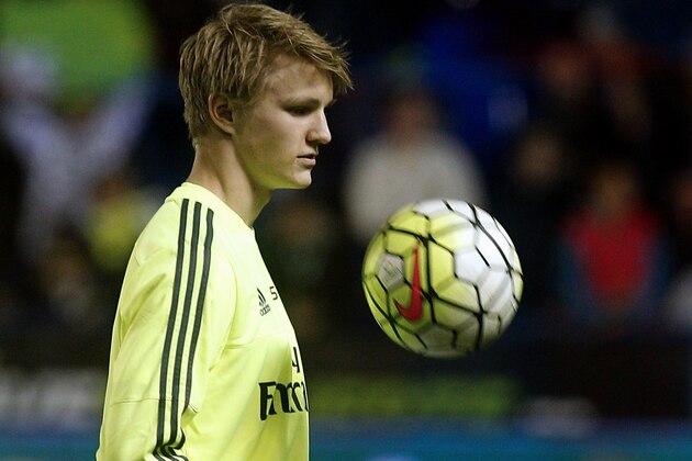 Real Madrid's Norwegian midfielder Martin Odegaard plays with the ball before the Spanish league football match Levante UD vs Real Madrid CF at the Ciutat de Valencia stadium in Valencia on March 2, 2016. / AFP / Jose Jordan        (Photo credit should read JOSE JORDAN/AFP/Getty Images)