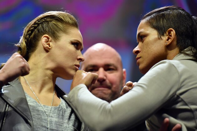 NEW YORK, NY - NOVEMBER 11:  UFC 207 opponents Ronda Rousey (L) and Amanda Nunes (R) face off after the UFC 205 weigh-in inside Madison Square Garden on November 11, 2016 in New York City. (Photo by Brandon Magnus/Zuffa LLC/Zuffa LLC via Getty Images)