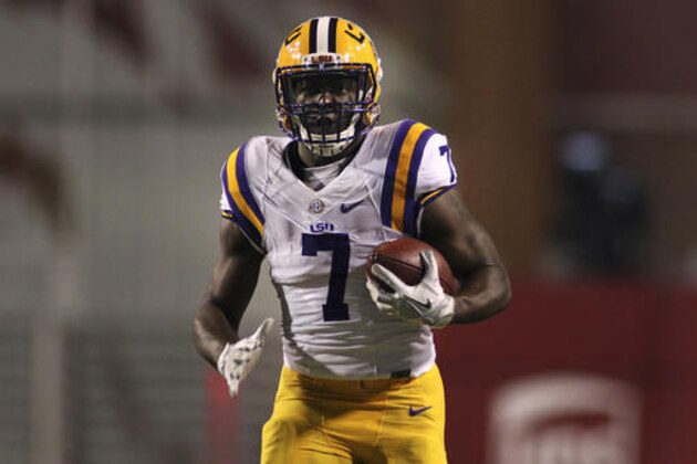 LSU's Leonard Fournette (7) rushes down the field during the first half of an NCAA college football game against Arkansas, Saturday, Nov. 12, 2016, in Fayetteville, Ark. (AP Photo/Samantha Baker)