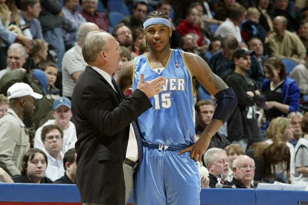 MINNEAPOLIS - FEBRUARY 9:  Head coach George Karl and Carmelo Anthony #15 of the Denver Nuggets talk during the game against the Minnesota Timberwolves on February 9, 2005 at the Target Center in Minneapolis, Minnesota.   The Timberwolves won 98-92.  NOTE TO USER: User expressly acknowledges and agrees that, by downloading and/or using this Photograph, user is consenting to the terms and conditions of the Getty Images License Agreement. Mandatory Copyright Notice: Copyright 2005 NBAE   (Photo by David Sherman/NBAE via Getty Images)