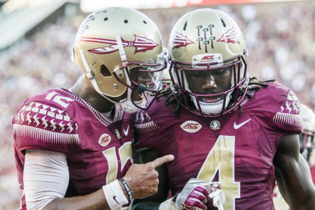 Florida State running back Dalvin Cook (4) and quarterback Deondre Francois celebrate Cook's touchdown against North Carolina in the second half of an NCAA college football game in Tallahassee, Fla., Saturday, Oct. 1, 2016. North Carolina defeated Florida State 37-35 on a field goal. (AP Photo/Mark Wallheiser)