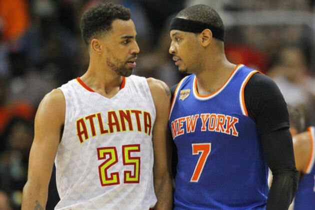 Atlanta Hawks' Thabo Sefolosha (25) and New York Knicks' Carmelo Anthony (7) confront each other after a technical foul is called on each of them during the first half of an NBA basketball game on Wednesday, Dec. 28, 2016, in Atlanta. Anthony was ejected from the game. (AP Photo/Todd Kirkland)