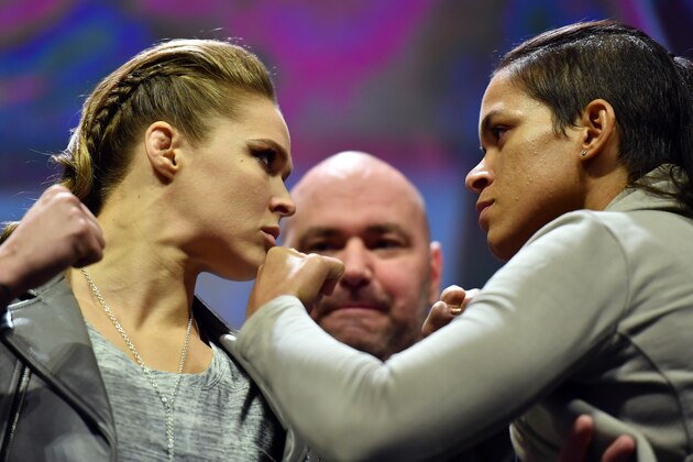 NEW YORK, NY - NOVEMBER 11:  UFC 207 opponents Ronda Rousey (L) and Amanda Nunes (R) face off after the UFC 205 weigh-in inside Madison Square Garden on November 11, 2016 in New York City. (Photo by Brandon Magnus/Zuffa LLC/Zuffa LLC via Getty Images)