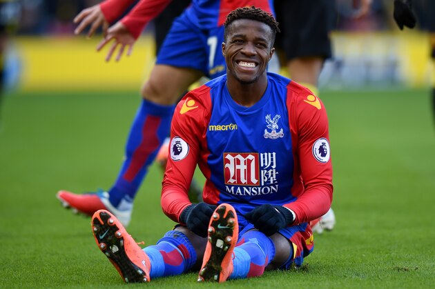 WATFORD, ENGLAND - DECEMBER 26:  Wilfried Zaha of Crystal Palace reacts after a challenge during the Premier League match between Watford and Crystal Palace at Vicarage Road on December 26, 2016 in Watford, England.  (Photo by Tony Marshall/Getty Images)