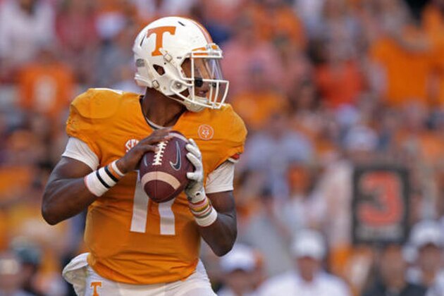 Tennessee quarterback Joshua Dobbs (11) looks for a receiver during the first half of an NCAA college football game against Alabama, Saturday, Oct. 15, 2016, in Knoxville, Tenn. (AP Photo/Wade Payne)