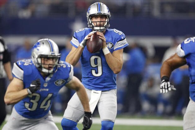 Detroit Lions' Zach Zenner (34) runs a route as Matthew Stafford (9) drops back to pass in the first half of an NFL football game against the Dallas Cowboys on Monday, Dec. 26, 2016, in Arlington, Texas. (AP Photo/Brandon Wade)