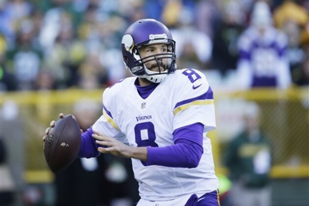 Minnesota Vikings' Sam Bradford throws during the first half of an NFL football game against the Green Bay Packers Saturday, Dec. 24, 2016, in Green Bay, Wis. (AP Photo/Jeffrey Phelps)