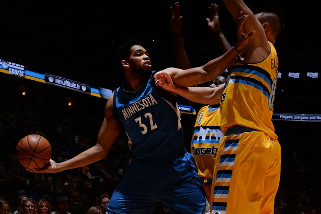 DENVER, CO - DECEMBER 28: Karl-Anthony Towns #32 of the Minnesota Timberwolves handles the ball against the Denver Nuggets on December 28, 2016 at the Pepsi Center in Denver, Colorado. NOTE TO USER: User expressly acknowledges and agrees that, by downloading and/or using this Photograph, user is consenting to the terms and conditions of the Getty Images License Agreement. Mandatory Copyright Notice: Copyright 2016 NBAE (Photo by Bart Young/NBAE via Getty Images)