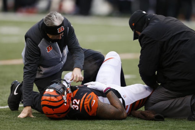 Cincinnati Bengals running back Jeremy Hill (32) lies on the field after an apparent injury in the second half of an NFL football game against the Pittsburgh Steelers, Sunday, Dec. 18, 2016, in Cincinnati. (AP Photo/Gary Landers)