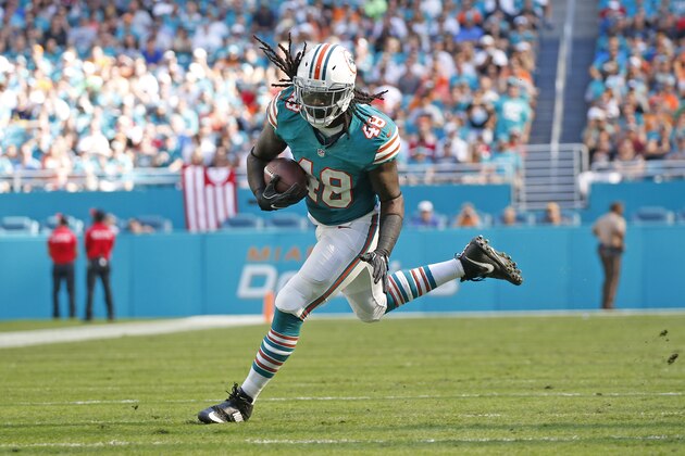 MIAMI GARDENS, FL - NOVEMBER 27: Marqueis Gray #48 of the Miami Dolphins runs with the ball against the San Francisco 49ers on November 27, 2016 at Hard Rock Stadium in Miami Gardens, Florida. The Dolphins defeated the 49ers 31-24. (Photo by Joel Auerbach/Getty Images)