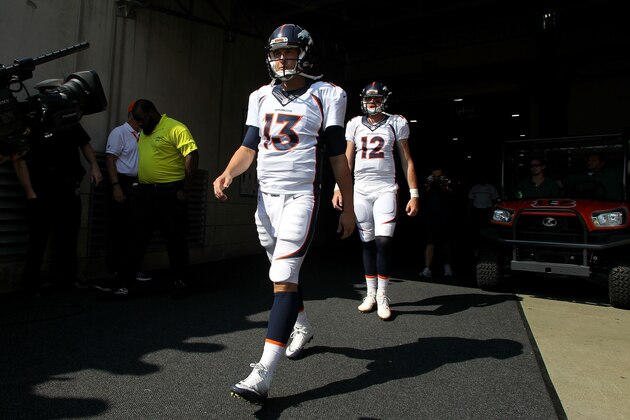 CINCINNATI, OH - SEPTEMBER 25:  Trevor Siemian #13 of the Denver Broncos and Paxton Lynch #12 of the Denver Broncos walk out to the field prior to the start of the game against the Cincinnati Bengals at Paul Brown Stadium on September 25, 2016 in Cincinnati, Ohio. (Photo by John Grieshop/Getty Images)