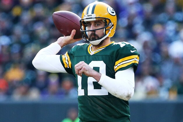 GREEN BAY, WI - DECEMBER 24:  Aaron Rodgers #12 of the Green Bay Packers throws a pass in the second quarter against the Minnesota Vikings at Lambeau Field on December 24, 2016 in Green Bay, Wisconsin. (Photo by Dylan Buell/Getty Images)