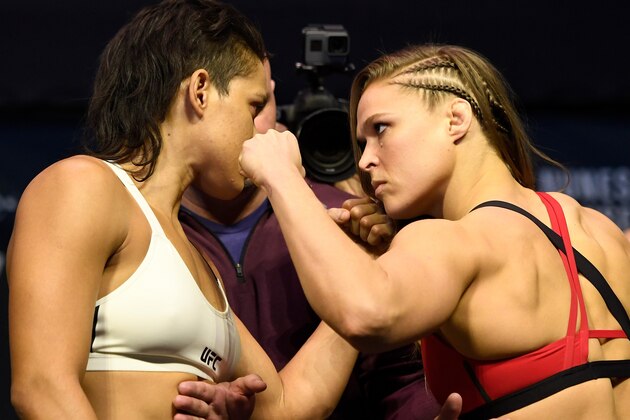 LAS VEGAS, NV - DECEMBER 29:  (L-R) UFC women's bantamweight champion Amanda Nunes of Brazil and Ronda Rousey face off during the UFC 207 weigh-in at T-Mobile Arena on December 29, 2016 in Las Vegas, Nevada. (Photo by Josh Hedges/Zuffa LLC/Zuffa LLC via Getty Images)