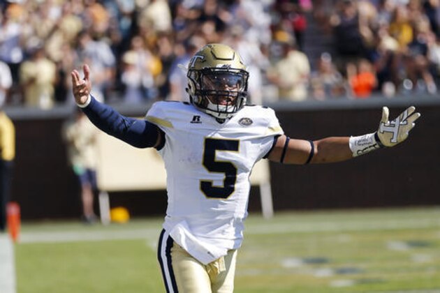 Georgia Tech quarterback Justin Thomas reacts after a touchdown against Duke in the first half of an NCAA college football game Saturday, Oct. 29, 2016, in Atlanta. (AP Photo/John Bazemore) in the first half of an NCAA college football game Saturday, Oct. 29, 2016, in Atlanta. (AP Photo/John Bazemore)