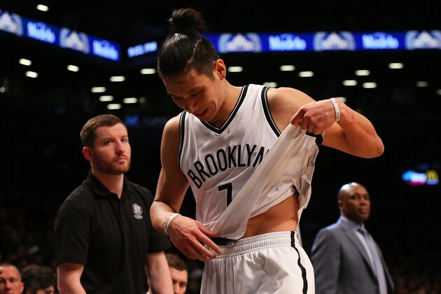 NEW YORK, NY - DECEMBER 26:  Jeremy Lin #7 of the Brooklyn Nets walks off the court after being injured against the Charlotte Hornets at Barclays Center on December 26, 2016 in Brooklyn borough of New York City. NOTE TO USER: User expressly acknowledges and agrees that, by downloading and or using this photograph, User is consenting to the terms and conditions of the Getty Images License Agreement. Nets defeated the Hornets 120-118.  (Photo by Mike Stobe/Getty Images)