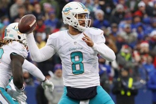 Miami Dolphins quarterback Matt Moore (8) throws a pass against the Buffalo Bills during the first half of an NFL football game Saturday, Dec. 24, 2016, in Orchard Park, N.Y. (AP Photo/Bill Wippert)
