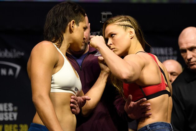 LAS VEGAS, NV - DECEMBER 29:  (L-R) UFC women's bantamweight champion Amanda Nunes of Brazil and Ronda Rousey face off during the UFC 207 weigh-in at T-Mobile Arena on December 29, 2016 in Las Vegas, Nevada. (Photo by Josh Hedges/Zuffa LLC/Zuffa LLC via Getty Images)