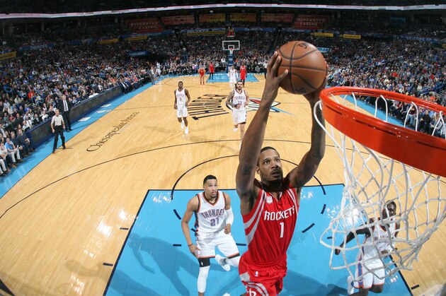 OKLAHOMA CITY, OK - DECEMBER 9: Trevor Ariza #1 of the Houston Rockets goes up for a dunk against the Oklahoma City Thunder on December 9, 2016 at Chesapeake Energy Arena in Oklahoma City, Oklahoma. NOTE TO USER: User expressly acknowledges and agrees that, by downloading and or using this photograph, User is consenting to the terms and conditions of the Getty Images License Agreement. Mandatory Copyright Notice: Copyright 2016 NBAE (Photo by Layne Murdoch/NBAE via Getty Images)