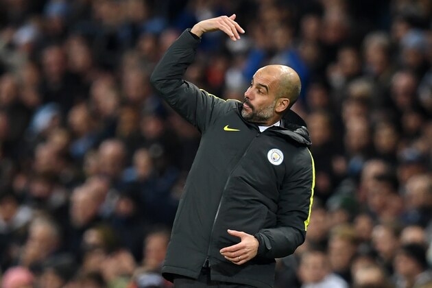 Manchester City's Spanish manager Pep Guardiola gestures on the touchline during the English Premier League football match between Manchester City and Arsenal at the Etihad Stadium in Manchester, north west England, on December 18, 2016. / AFP / Paul ELLIS / RESTRICTED TO EDITORIAL USE. No use with unauthorized audio, video, data, fixture lists, club/league logos or 'live' services. Online in-match use limited to 75 images, no video emulation. No use in betting, games or single club/league/player publications.  /         (Photo credit should read PAUL ELLIS/AFP/Getty Images)
