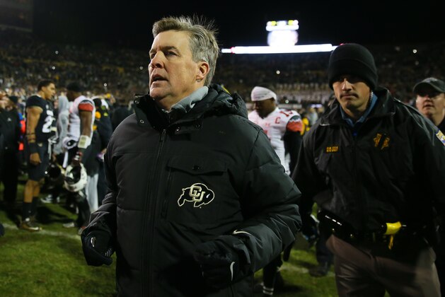 BOULDER, CO - NOVEMBER 26:  Head Coach Mike MacIntyre of the Colorado Buffaloes runs off the field after defeating the Utah Utes at Folsom Field on November 26, 2016 in Boulder, Colorado. Colorado defeated Utah 27-22 and win the Pac-12 South. The Buffaloes will play Washington next week in the Pac-12 Championship. (Photo by Justin Edmonds/Getty Images)