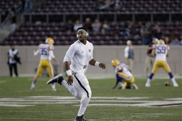 Texas A&M defensive lineman Myles Garrett warms up before a college football game against LSU Thursday, Nov. 24, 2016, in College Station, Texas. (AP Photo/David J. Phillip)