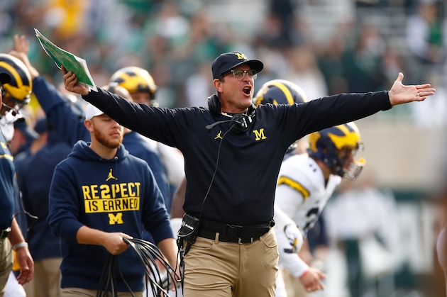 EAST LANSING, MI - OCTOBER 29: Head coach Jim Harbaugh reacts on the sidelines while playing the Michigan State Spartans at Spartan Stadium on October 29, 2016 in East Lansing, Michigan. Michigan won the game 32-23. (Photo by Gregory Shamus/Getty Images)