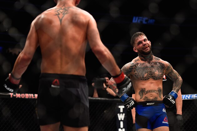 LAS VEGAS, NV - DECEMBER 30:  (R-L) Cody Garbrandt taunts Dominick Cruz in their UFC bantamweight championship bout during the UFC 207 event at T-Mobile Arena on December 30, 2016 in Las Vegas, Nevada.  (Photo by Jeff Bottari/Zuffa LLC/Zuffa LLC via Getty Images)