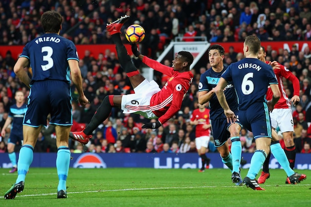 MANCHESTER, ENGLAND - DECEMBER 31:  Paul Pogba of Manchester United  attempts a scissor or bicycle kick shot on goal during the Premier League match between Manchester United and Middlesbrough at Old Trafford on December 31, 2016 in Manchester, England.  (Photo by Alex Livesey/Getty Images)