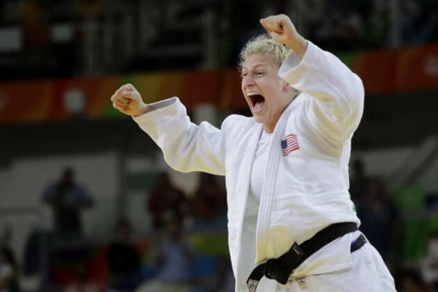 United States' Kayla Harrison, left, celebrates after defeating France's Audrey Tcheumeo in the women's 78-kg judo gold medal match at the 2016 Summer Olympics in Rio de Janeiro, Brazil, Thursday, Aug. 11, 2016. (AP Photo/Jae C. Hong)