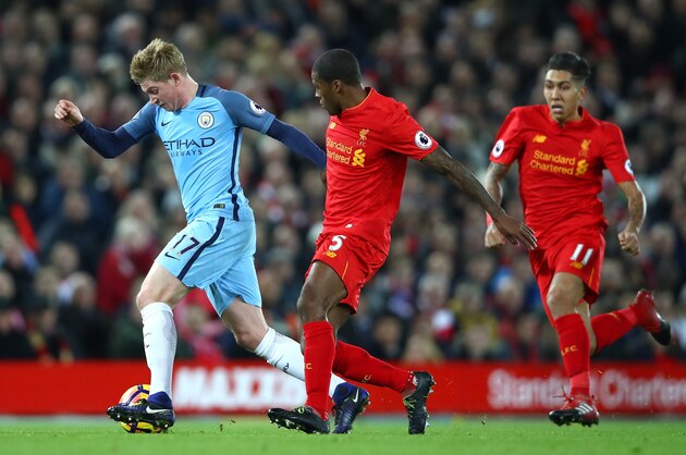 LIVERPOOL, ENGLAND - DECEMBER 31: Georginio Wijnaldum of Liverpool chases Kevin De Bruyne of Manchester City during the Premier League match between Liverpool and Manchester City at Anfield on December 31, 2016 in Liverpool, England.  (Photo by Clive Brunskill/Getty Images)