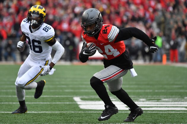 COLUMBUS, OH - NOVEMBER 26:   Malik Hooker #24 of the Ohio State Buckeyes runs for a touchdown after intercepting a pass by Wilton Speight #3 (not pictured) of the Michigan Wolverines during the first half of their game at Ohio Stadium on November 26, 2016 in Columbus, Ohio.  (Photo by Jamie Sabau/Getty Images)