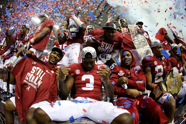 ATLANTA, GA - DECEMBER 31:  Players from the Alabama Crimson Tide celebrate after winning 24 to 7 against the Washington Huskies during the 2016 Chick-fil-A Peach Bowl at the Georgia Dome on December 31, 2016 in Atlanta, Georgia.  (Photo by Maddie Meyer/Getty Images)
