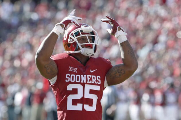 Oklahoma running back Joe Mixon (25) during the first half of a NCAA college football game against Baylor in Norman, Okla. on Saturday, Nov. 12, 2016. (AP Photo/Alonzo Adams)
