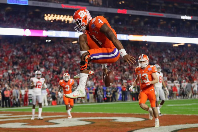 GLENDALE, AZ - DECEMBER 31:  Deshaun Watson #4 of the Clemson Tigers reacts after scoring a third quarter touchdown during the 2016 PlayStation Fiesta Bowl against the Ohio State Buckeyes at University of Phoenix Stadium on December 31, 2016 in Glendale, Arizona.  (Photo by Jamie Squire/Getty Images)