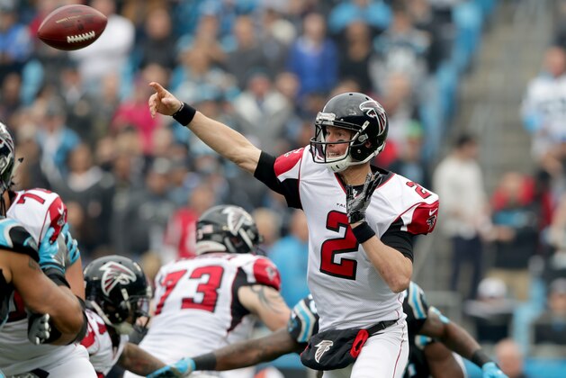 CHARLOTTE, NC - DECEMBER 24:   Matt Ryan #2 of the Atlanta Falcons throws a pass against the Carolina Panthers in the 1st quarter during their game at Bank of America Stadium on December 24, 2016 in Charlotte, North Carolina.  (Photo by Streeter Lecka/Getty Images)