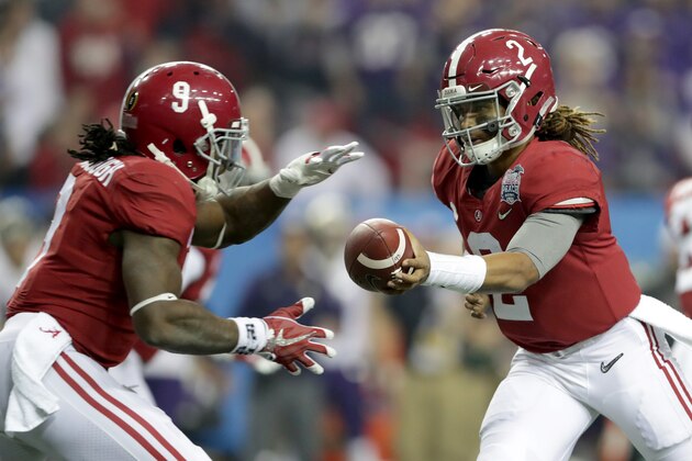 ATLANTA, GA - DECEMBER 31:  Jalen Hurts #2 of the Alabama Crimson Tide hands the ball off to Bo Scarbrough #9 of the Alabama Crimson Tide during the 2016 Chick-fil-A Peach Bowl at the Georgia Dome on December 31, 2016 in Atlanta, Georgia.  (Photo by Streeter Lecka/Getty Images)