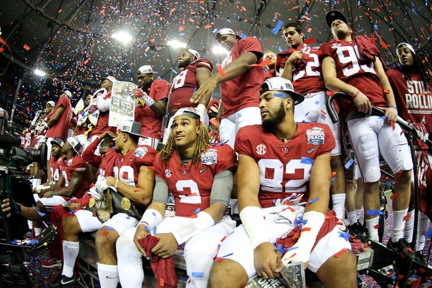 ATLANTA, GA - DECEMBER 31:  Jalen Hurts #2 of the Alabama Crimson Tide celebrates with his teammates after winning 24 to 7 against Washington Huskies during the 2016 Chick-fil-A Peach Bowl at the Georgia Dome on December 31, 2016 in Atlanta, Georgia.  (Photo by Maddie Meyer/Getty Images)