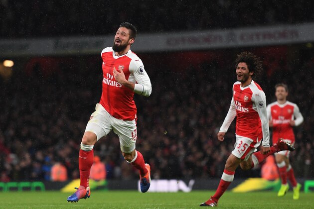LONDON, ENGLAND - JANUARY 01:  Olivier Giroud #12 of Arsenal celebrates after scoring the opening goal during the Premier League match between Arsenal and Crystal Palace at the Emirates Stadium on January 1, 2017 in London, England.  (Photo by Shaun Botterill/Getty Images)