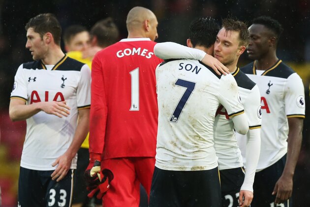 WATFORD, ENGLAND - JANUARY 01:  Heung-Min Son and Christian Eriksen of Tottenham Hotspur embrace after the Premier League match between Watford and Tottenham Hotspur at Vicarage Road on January 1, 2017 in Watford, England.  (Photo by Alex Morton/Getty Images)