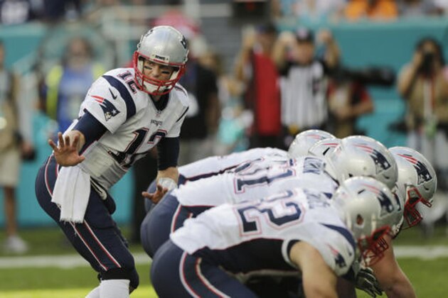 New England Patriots quarterback Tom Brady (12) gestures on the line of scrimmage, during the second half of an NFL football game against the Miami Dolphins, Sunday, Jan. 1, 2017, in Miami Gardens, Fla. (AP Photo/Alan Diaz)