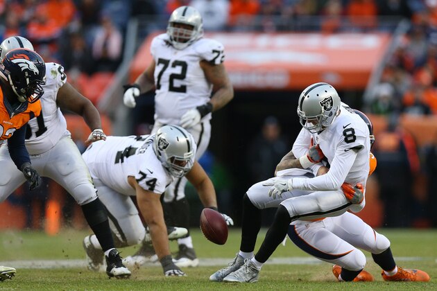 DENVER, CO - JANUARY 1:  Outside linebacker Shane Ray #56 of the Denver Broncos sacks quarterback Connor Cook #8 of the Oakland Raiders and fumbles the ball in the third quarter of the game at Sports Authority Field at Mile High on January 1, 2017 in Denver, Colorado. (Photo by Justin Edmonds/Getty Images)