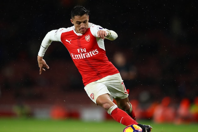 LONDON, ENGLAND - JANUARY 01:  Alexis Sanchez of Arsenal runs with the ball during the Premier League match between Arsenal and Crystal Palace at the Emirates Stadium on January 1, 2017 in London, England.  (Photo by Clive Mason/Getty Images)