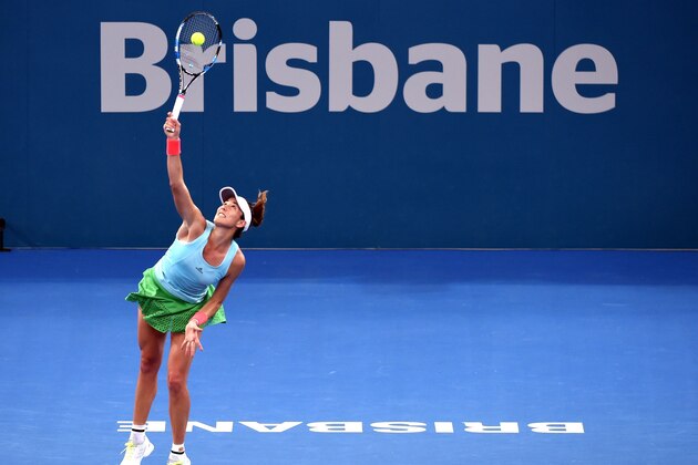 Garbine Muguruza of Spain serves against Samantha Stosur of Australia in the women's round one at the Brisbane International tennis tournament in Brisbane on January 2, 2017. / AFP / SAEED KHAN / --IMAGE RESTRICTED TO EDITORIAL USE - STRICTLY NO COMMERCIAL USE--        (Photo credit should read SAEED KHAN/AFP/Getty Images)